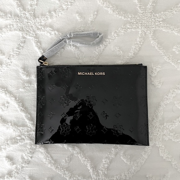 Michael Kors Black Floral Embossed Wristlet - Picture 1 of 6